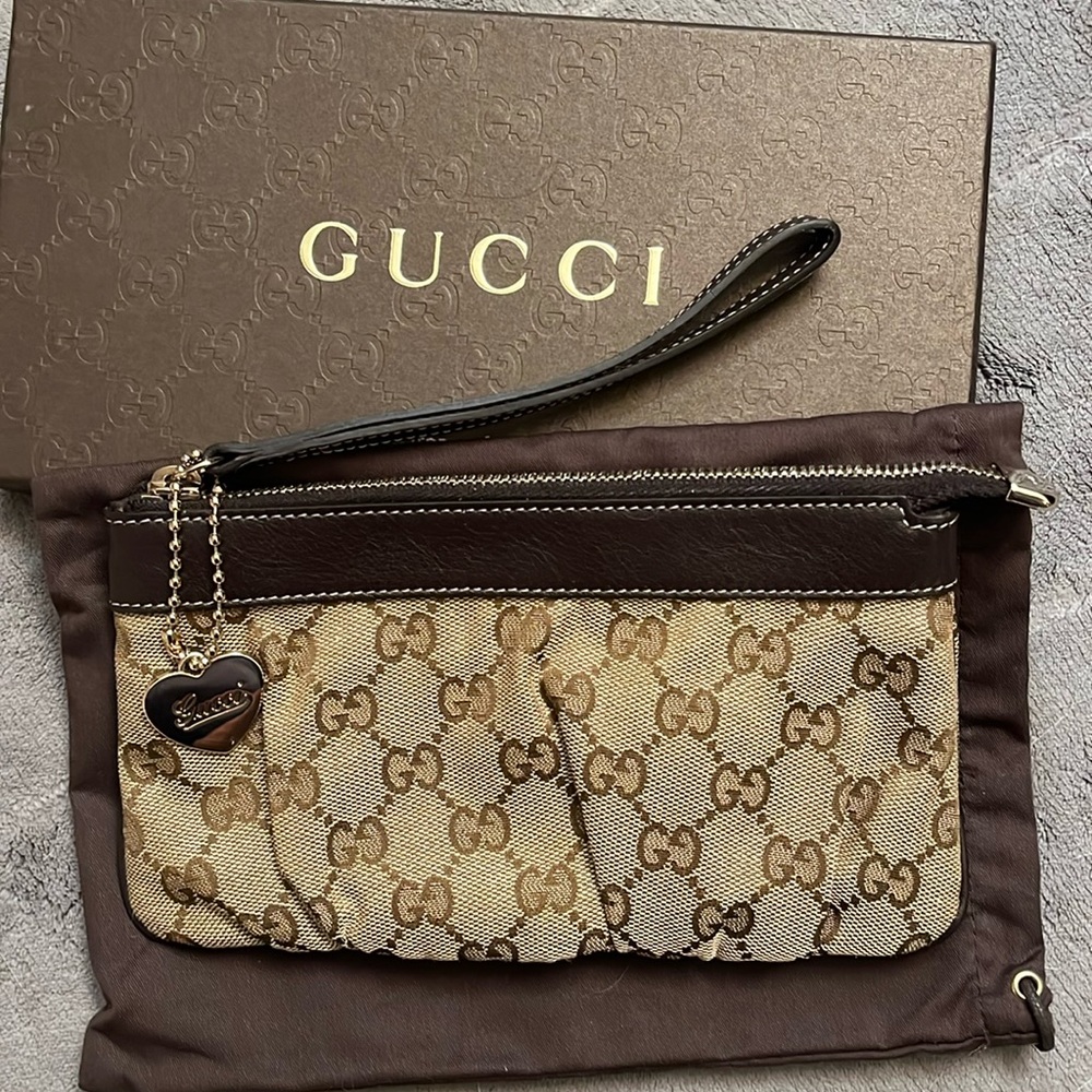 New - vintage authentic Gucci monogram wristlet